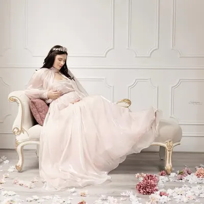 The queen has arrived. This Victorian-inspired maternity portrait is the pinnacle of our luxury sessions, designed to make you feel like royalty as you celebrate new life.