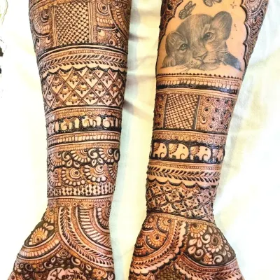 Your mehndi should tell your story. This bride was a huge fan of The Lion King, so I incorporated a portrait of Simba into her full bridal henna. I can add any custom motif that is special to you.