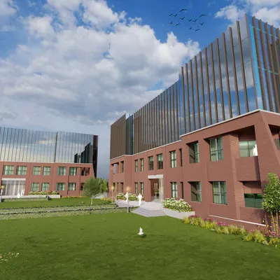 A perspective of the Greater Noida college campus, showing the two main blocks separated by a central green quadrangle. This layout fosters a sense of community and provides a tranquil space for students.
