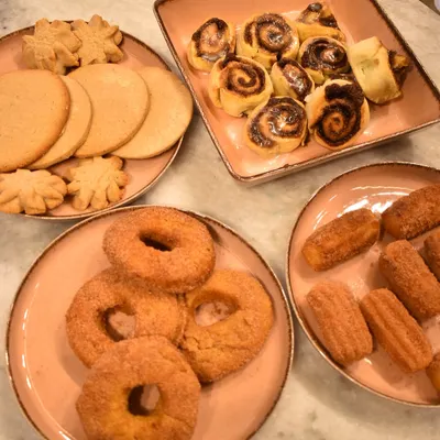 A little chef in the making. This young baker had a wonderful time in my kids' class, where she learned to make cinnamon churros, donuts, rolls, and cookies from scratch.