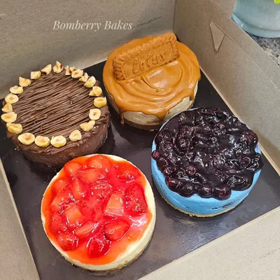 An assortment box of my mini cheesecakes. This one includes Nutella Hazelnut, Biscoff, Blueberry, and Strawberry flavors.