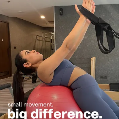 Small movement, big difference. This back extension on the stability ball, assisted by the tower, strengthens the entire posterior chain.