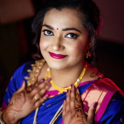A beautiful portrait of the bride-to-be at her engagement ceremony, her smile radiating happiness.