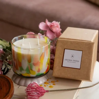 This is one of my favorite artistic creations. The three-wick soy candle, housed in a vibrant, hand-finished glass jar, is a statement piece that brings both beautiful fragrance and a pop of color to your home. It comes ready to gift in a simple, eco-friendly kraft box.