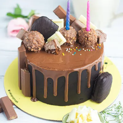 A chocolate lover's dream come true. This decadent chocolate drip cake is overloaded with Ferrero Rocher, KitKat, and other chocolate treats, making it one of our bestsellers.