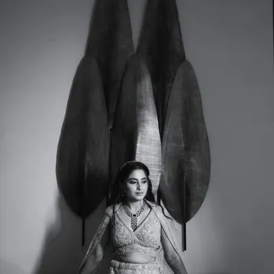 A stunning black and white bridal portrait of Richa. Monochrome photos often highlight emotion and form, creating a timeless and artistic feel.