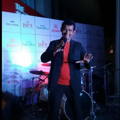 On stage at a corporate event for major brands like Raymond and Park Avenue. As an emcee, I ensure the event flows smoothly while keeping the audience engaged.