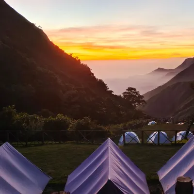 This is the view from our campsite in Munnar. We set up tents with this incredible valley view, ready for an early morning sunrise trek.