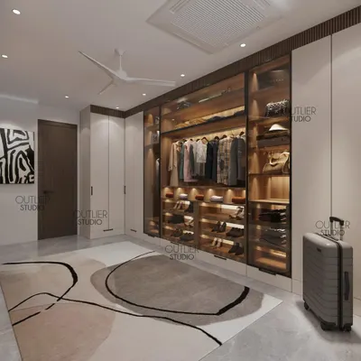 Elevate your everyday with this dreamy walk-in wardrobe design. The glass-fronted, backlit closets provide a beautiful and organized way to display your collection.