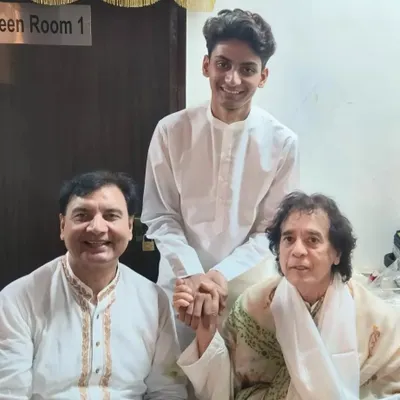 A beautiful memory from the Guru Purnima celebration in Mumbai, in honour of the legend Ustad Allah Rakha Khan Sahab. Here I am with Ustad Zakir Hussain ji and my son.