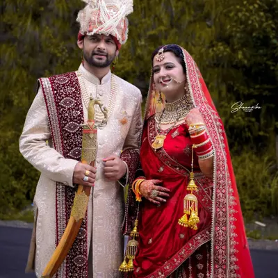 A classic portrait of the bride and groom. I make sure to capture both the traditional attire and the genuine smiles that tell your unique love story.