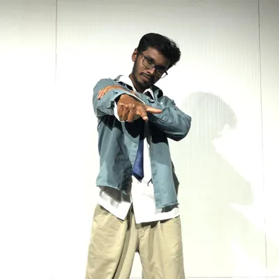 A solo shot from a performance day. This is me in my element, pointing to the crowd and connecting with them through the dance.