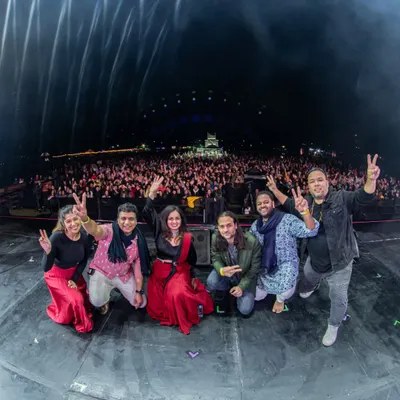 A group photo with my incredible band after an electrifying performance at the Jazz Al Parque festival. The energy from the massive crowd was unbelievable, and sharing this moment with my musical family made it even more special.