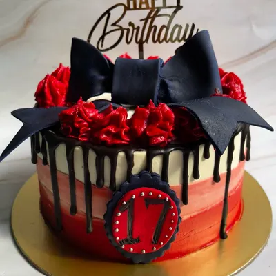 Can I call you rose? Our Classic Chocolate Truffle Cake gets a dramatic makeover with a red ombre finish, chocolate drip, and a striking black fondant bow for a 17th birthday.