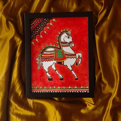 This is Raj Ashva, the royal horse, a symbol of strength and nobility. I painted this white horse with colorful adornments against a striking red background to give it a majestic feel.