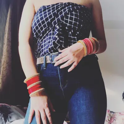 Don't give up on that old shirt just yet. Here, I've taken a standard button-down and creatively styled it into a strapless tube top, giving it a whole new life. This is a core part of my wardrobe remixing sessions.
