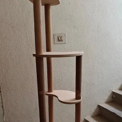 A custom cat tree, built by Swapnil and Poonam over a two-day workshop. Now their cat has a dedicated space to relax and play.