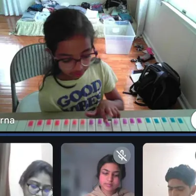 A screenshot of our combined offline and online class in session. We have special batches for our students in the USA, teaching vocals, guitar, and piano.