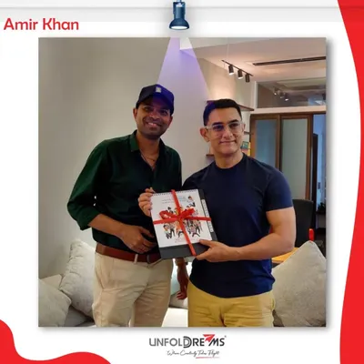 Presenting a special calendar featuring my caricatures to Aamir Khan. He has always been a great supporter of my work, using it for various occasions.