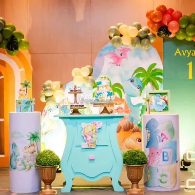 A full stage setup for Avyaan's 'Little Dino' first birthday. We used a friendly color palette, cute dinosaur characters, and a custom dessert table to create a fun and inviting scene.