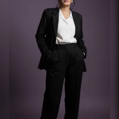 A full-length portrait in my professional attire. This look represents my readiness to stand tall and fight for my clients in any courtroom.