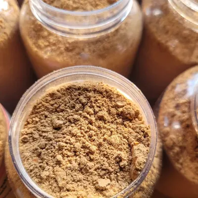 This is my Chocolate Ubtan, a luxurious powder face and body pack. It helps you get tan-free, spotless, and even-toned skin with a natural glow.