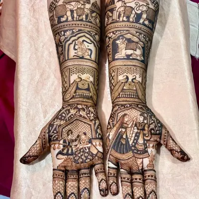 This is our signature portrait work. The design features a detailed bride and groom varmala scene, a depiction of Lord Ganesha, and a beautiful doli scene, all rendered with incredible precision.
