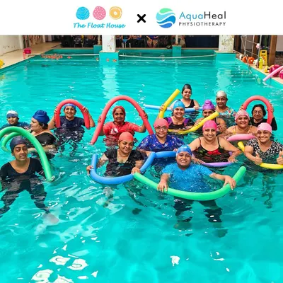 This is what our community is all about. A happy group enjoying an AquaHeal physiotherapy session, using foam noodles for support and resistance. It’s therapy that feels like fun with friends.