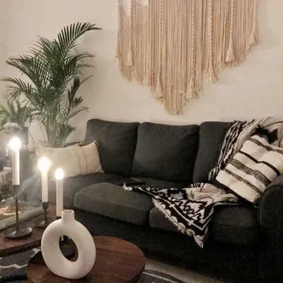 I was so happy to receive this photo from a customer! My neutral-toned wall hanging looks so perfect and cozy above their dark sofa, adding texture and a calming bohemian vibe to their living room.