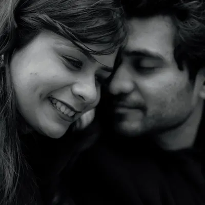 A soft and intimate black and white close-up. This portrait of Nikunj and Mansi is all about tenderness, capturing a quiet moment of connection that feels incredibly personal.