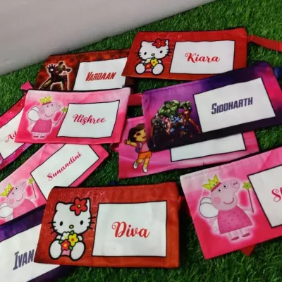 These customized cartoon pouches are a super hit for birthday return gifts. Made from soft satin material, I can print any cartoon character like Peppa Pig or Hello Kitty and add the child's name.