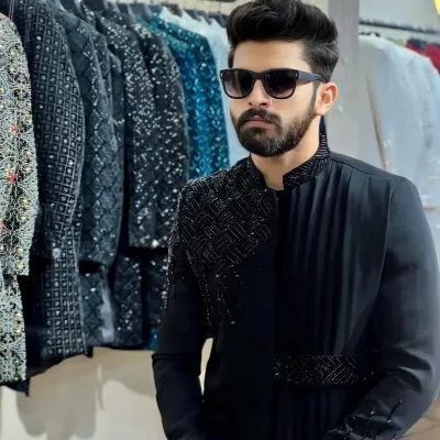 A closer look at my black draped Indowestern set. The design features a structured jacket with an integrated pleated drape, detailed with geometric black beadwork for a sharp, modern aesthetic.