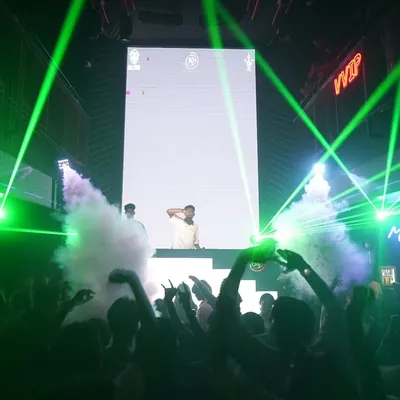 The full club experience. I combine electrifying music with dynamic visuals like CO2 cannons and lasers to create a sensory overload that keeps the party going all night.