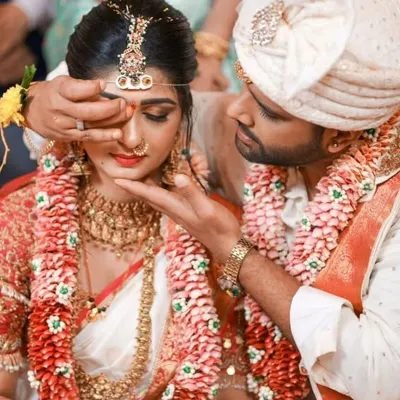 A beautiful, intimate moment from actress Aditi Prabhudeva's wedding ceremony. I created a classic South Indian bridal look for her, with traditional gold jewellery, a flawless base, and emphasis on her expressive eyes.