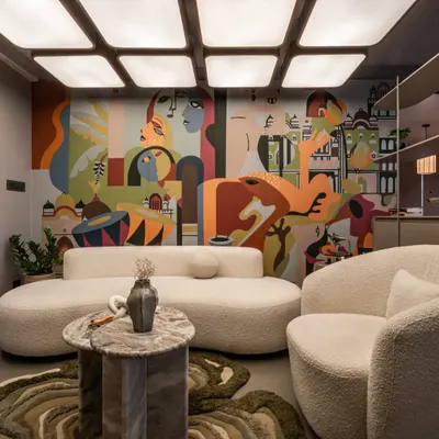 A full view of our mural for a wedding planner's office, designed to embody drama, chaos, and choreography. The artwork blends cityscapes, folk elements, and modern abstraction to tell a story of vibrant celebrations.