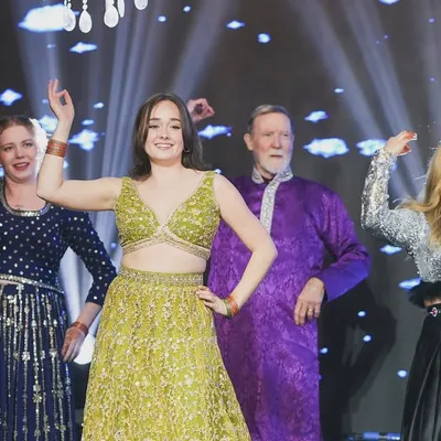 We love teaching clients from all over the world. This group of friends and family, dressed in beautiful Indian attire, brought so much joy and energy to the stage for their Sangeet performance.