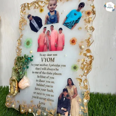 A beautiful and heartfelt personalized resin photo frame. I can help you create a similar keepsake with your own photos and messages.