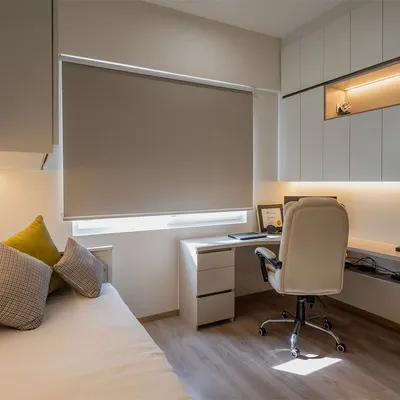 A perfect example of a multi-functional room. This space serves as a home office with a corner desk and overhead storage, and also as a guest room with a comfortable daybed.