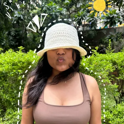 Our handmade crochet bucket hat is the perfect accessory for sunny days. It's lightweight, easy to pack, and can be customized in your favorite color.