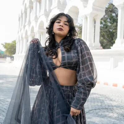 Who said wearing Indian can't be fun and playful? This fashion-forward grey plaid lehenga is a perfect Indo-Western look.