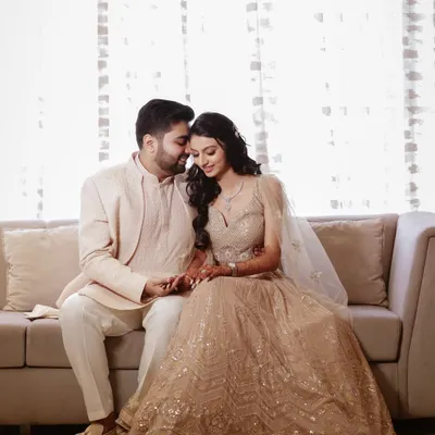 A quiet moment on the couch, away from the wedding hustle. We look for these simple, intimate settings to capture the natural chemistry between a couple.