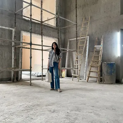My love for double-height ceilings begins at the structural stage. Here at our Civil Lines site, the raw space already hints at the grandeur to come, designed to create a dramatic entrance foyer with abundant natural light.