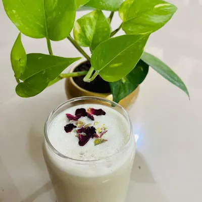 My plant-based Thandai is the perfect summer drink. It's made from coconut milk and almonds, infused with spices, and garnished with rose petals for a beautiful, cooling beverage that nourishes from within.