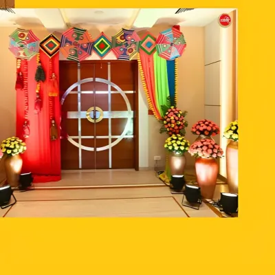 We create grand welcomes that immerse your guests in the celebration from the start. This entrance for a Haldi ceremony features colorful drapes and a valance of decorative Rajasthani umbrellas, setting a joyful and traditional tone.