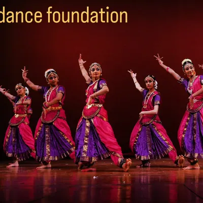 Our senior Bharatanatyam students in a full-costume performance. This is the culmination of years of dedicated practice, showcasing their grace, precision, and deep understanding of the art form.