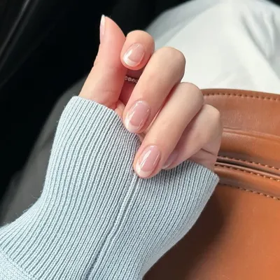 The timeless classic. A perfect, clean, and elegant French manicure on beautifully shaped natural nails. This look never goes out of style.