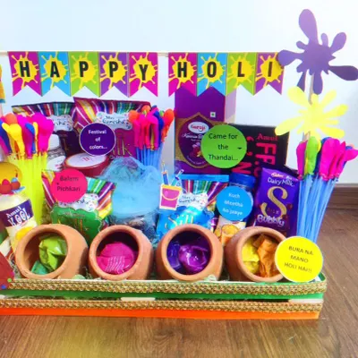 Celebrate the festival of colors with my vibrant Holi hamper. It comes fully loaded with organic gulal in earthen pots, water guns (pichkaris), thandai mix, and a variety of snacks to make your celebration complete and joyful.