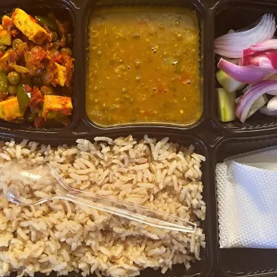 My special Diet Thali, designed for the health-conscious. This meal includes high-protein tofu paneer sabzi, yellow dal, and nutritious brown rice instead of white.
