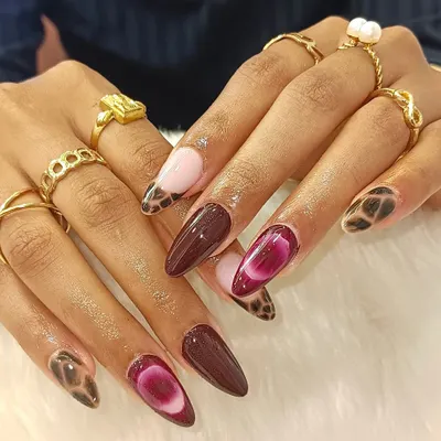 Bold, glossy, and unapologetically luxe. This set is not for the faint-hearted, featuring deep wine swirls, smoky marble, and animal print for a truly high-fashion look.