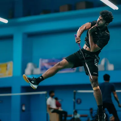 A player captured in a moment of pure athleticism, executing a flying smash. These are the high energy moments we love to see during our competitive events.